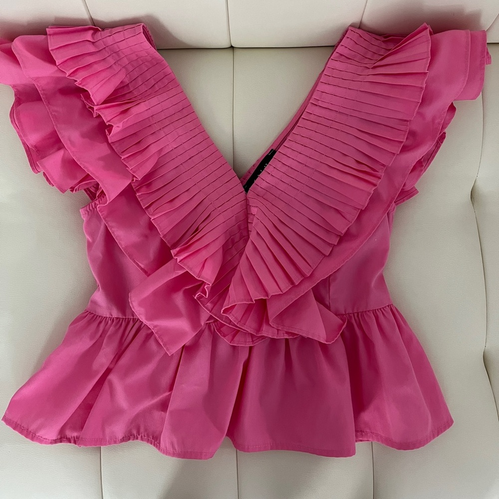Pink sleeveless ruffle top